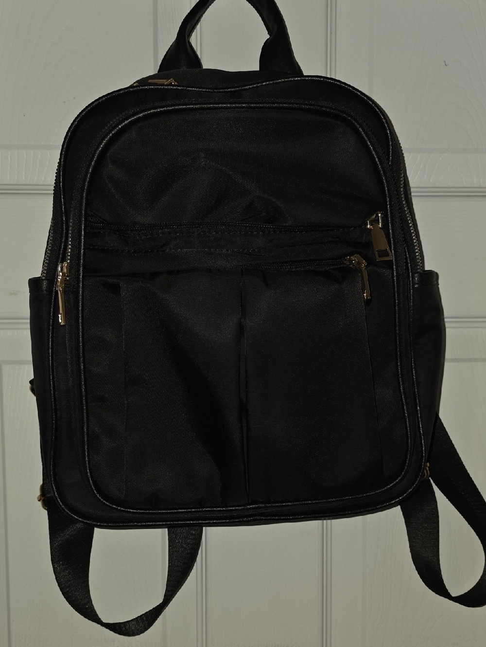 Black Purse Backpack with Gold Hardware